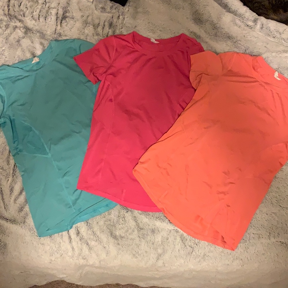 set of three athletic shirts